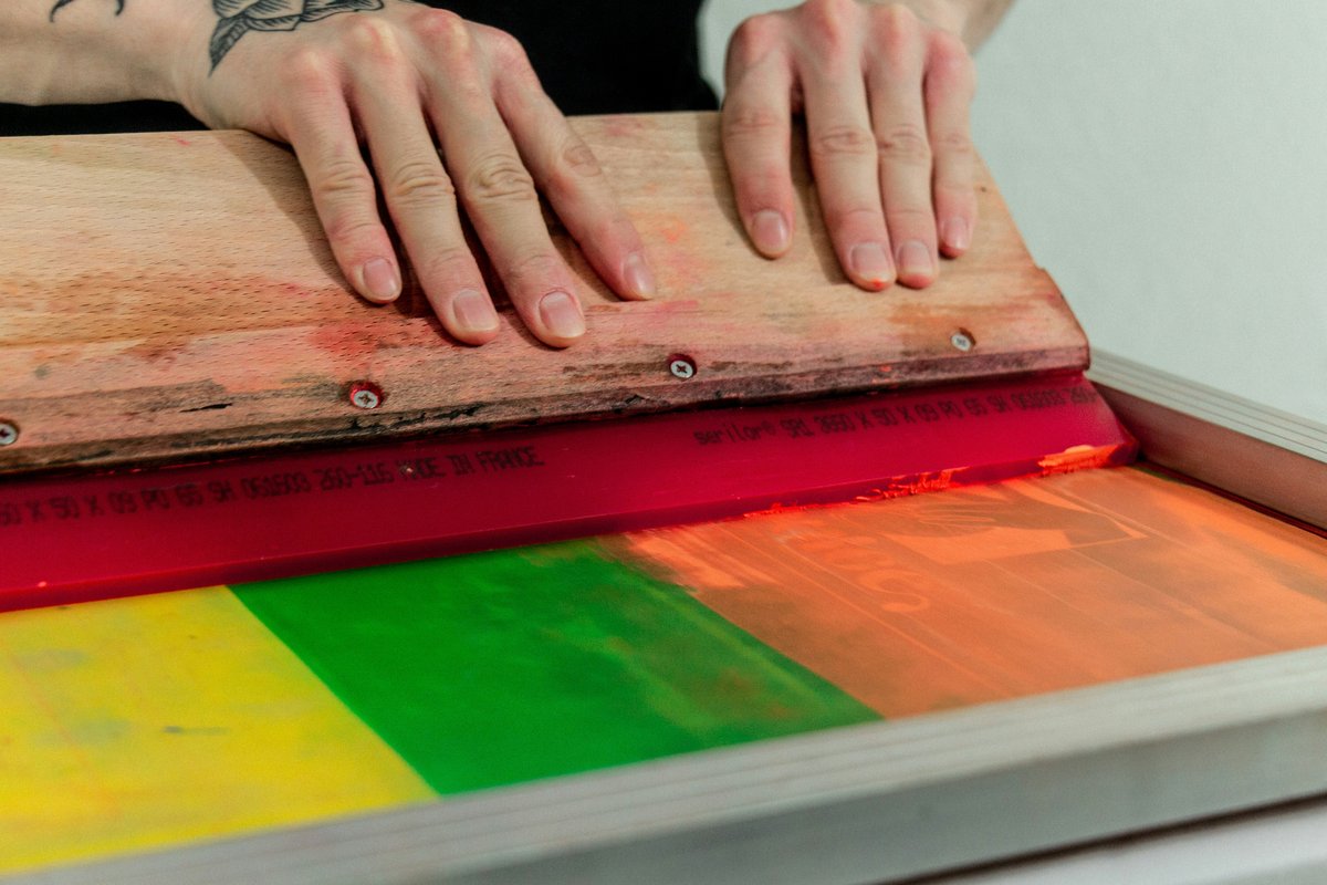 Squeegee pushing ink